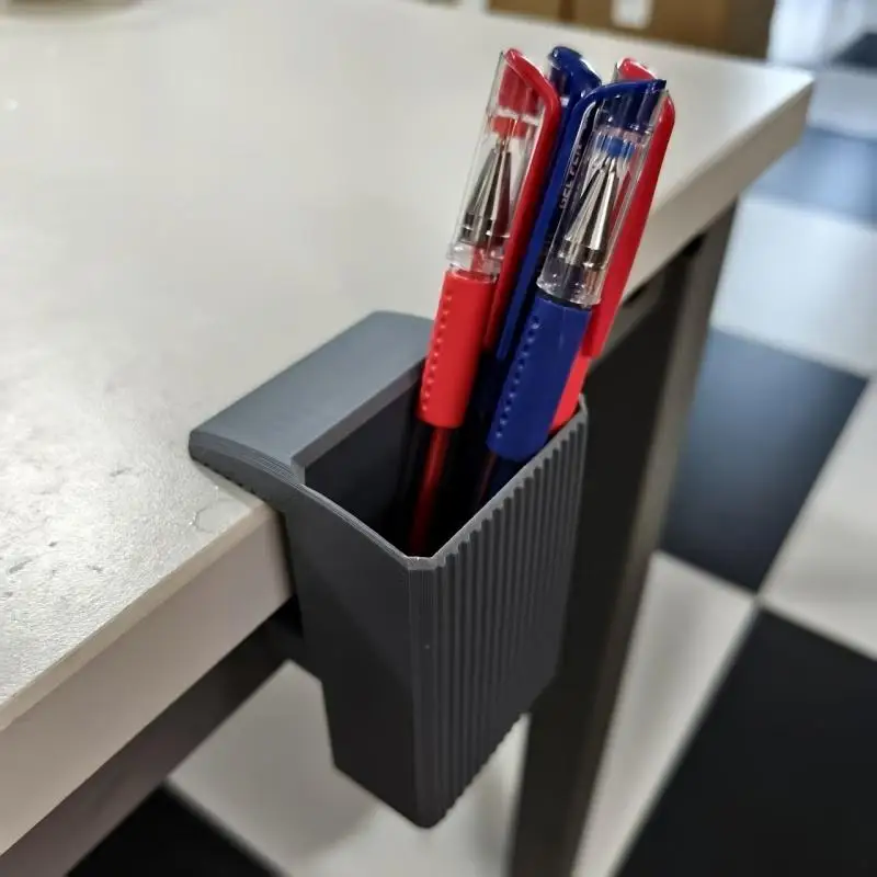 

The new clamp-type desk-side pen holder organizer is sturdy and easy to install. It is suitable for both office and home storage