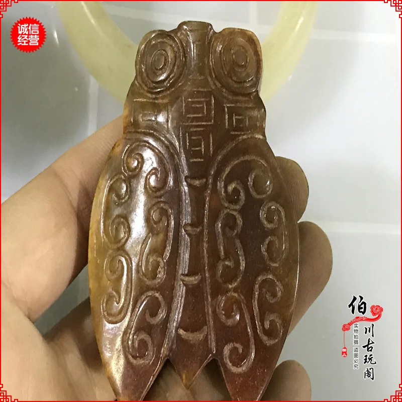 

In the Han Dynasty, the old jade cicada ornaments were put in the Warring States period.