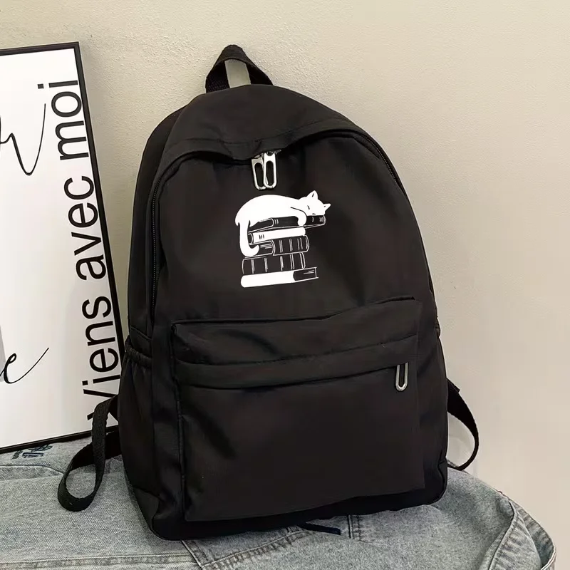 This large-capacity, casual, and versatile backpack is perfect for back-to-school season. It features a simple English print of