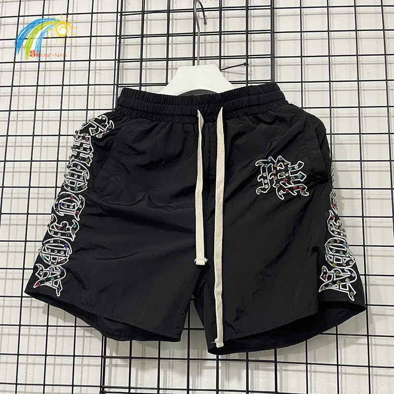 

Высококачественные тканые быстросохнущие бриджи на шнурке для мужчин и женщин, повседневные классические шорты с вышивкой логотипа и бриллиантами, смешанные шорты EMOTION