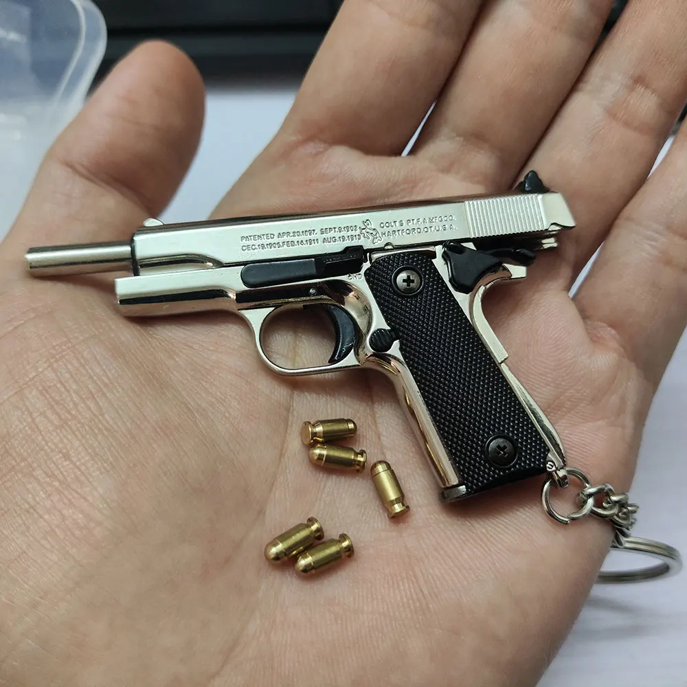 1:3 M1911 المفاتيح قذيفة إخراج 92F مسدس لعبة جمع سبيكة مسدسات مفتاح سلسلة هدية للرجال الأولاد جمع