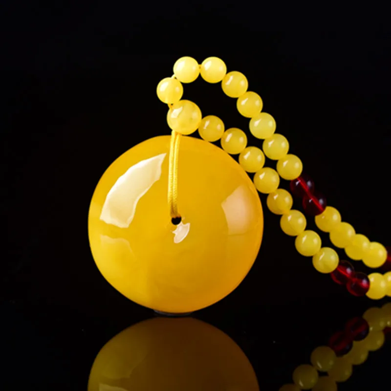 Gift Exhibition: Beeswax Amber Arhat Eye Pendant, Simple Design for Men and Women