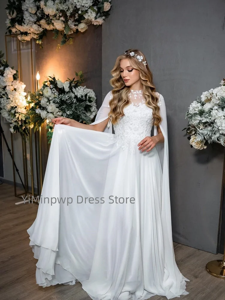 Eleganckie suknie ślubne z długimi, zwiewnymi rękawami, z wysokim dekoltem, zdobione aplikacjami i cekinami, szyte na miarę suknie ślubne z szyfonu, suknia ślubna robe de mariée