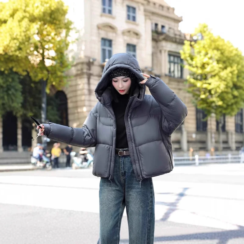 Chaqueta de plumón para mujer, abrigo versátil grueso elegante a la moda para ir al trabajo, novedad de 2025, invierno