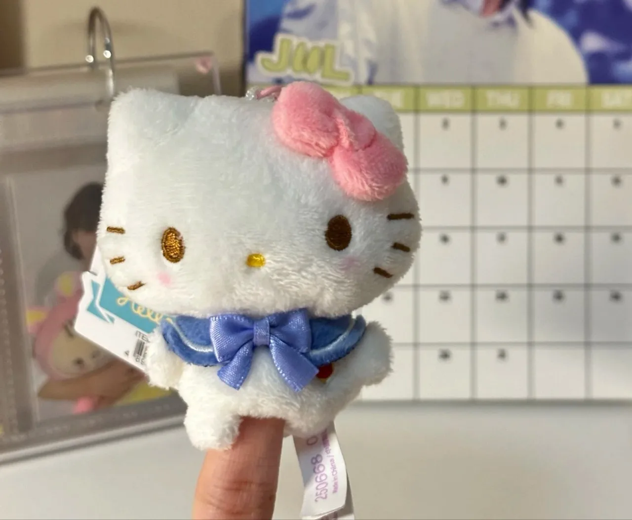 귀여운 산리오 헬로키티 봉제 인형 키체인 손가락 인형 파란 리본 장난감 봉제 동물 인형 키링 펜던트 장난감 소녀용