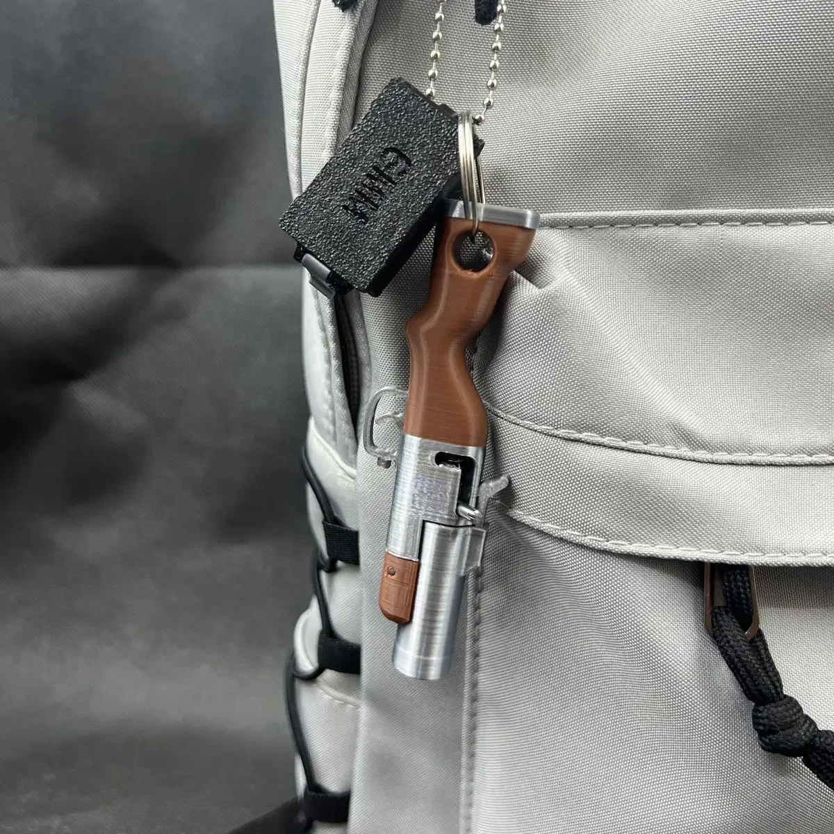 3D-gedruckter Schlüsselanhänger, kann kleine Kugeln feuern, Mini-Soft-Bullet-Pistole, Spielzeug, Rucksack-Anhänger