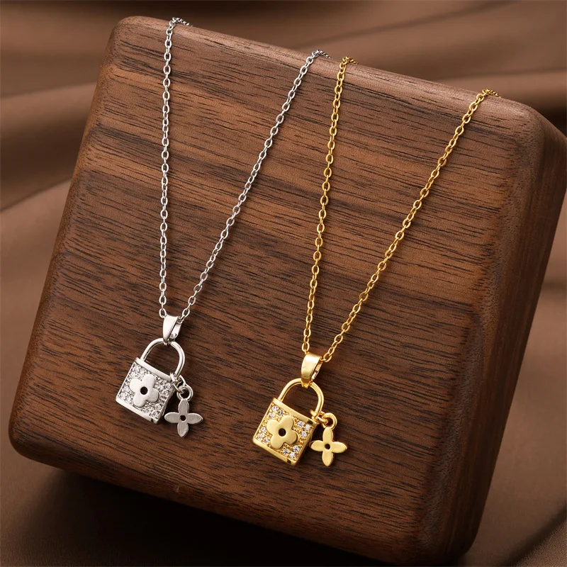 Collar con cabeza de cerradura de acero de titanio a la moda para mujer, colgante de diseño único, joyería, accesorio elegante