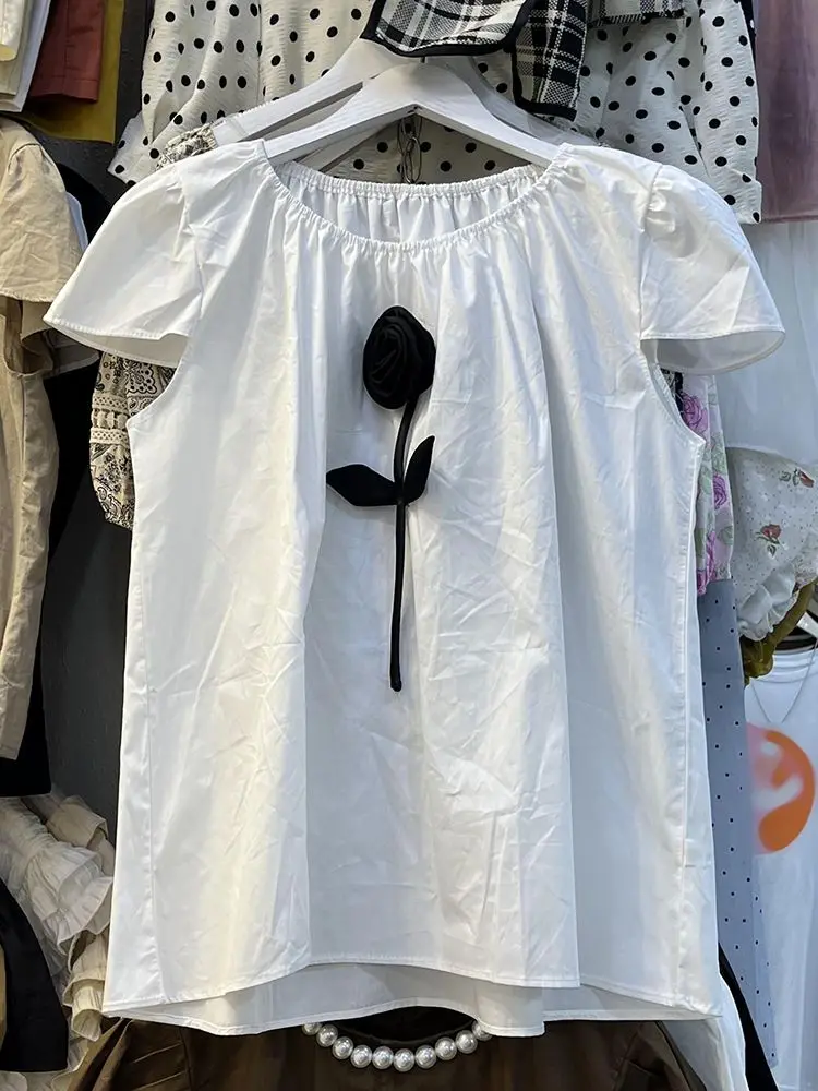 フレンチスイート年齢軽減デザインニッチ立体フラワーパフスリーブシャツ女性の新しい夏のトップ