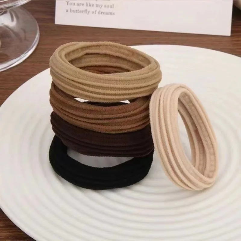 Minimalist hair ties for women, non-damaging, fit top knots/high ponytails, elastic, durable,  comfortable & unbreakable.