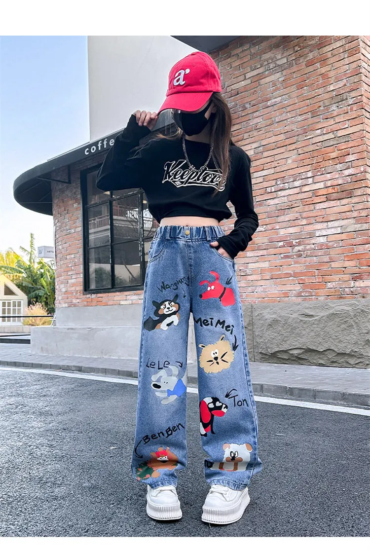 Heißer Verkauf: Blaue Jeans für Teenager-Mädchen mit Cartoon-Print, elastischem Mittelbund, lockerer Passform, Frühlingsmode, niedliche Kinderhose mit weitem Bein. – Detail 3