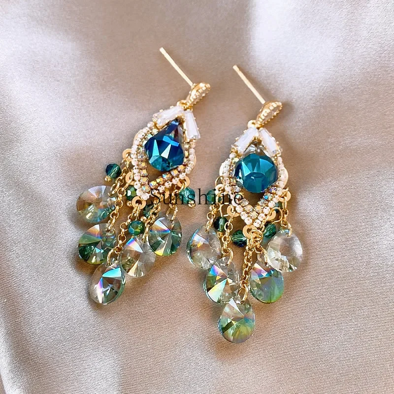 Ethnic style crystal fringed women's light luxury high-end sense retro earrings vacation style niche earrings