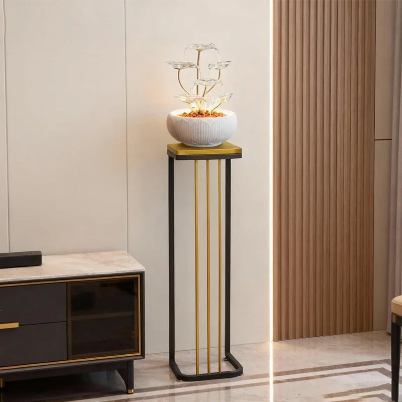 Floor-to-ceiling flowing water ornament next to the TV cabinet, light luxury and simple lotus fountain ,  lucky decoration