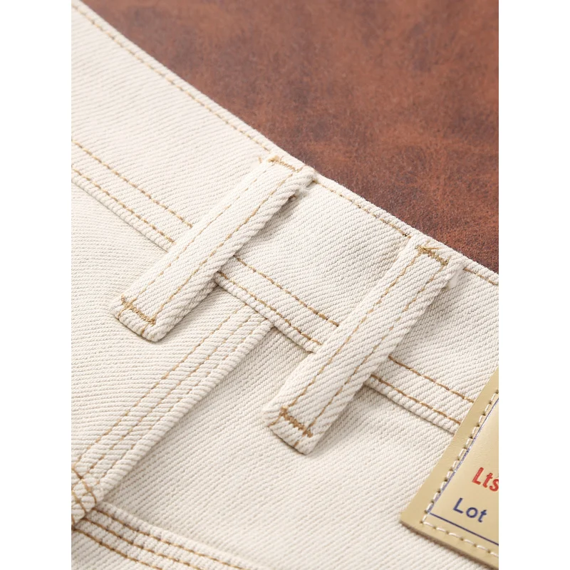 Jeans bianchi alla moda da uomo stile autunnale semplice moda casual abbigliamento da uomo slim fit piccoli pantaloni di lusso leggeri a tubo dritto