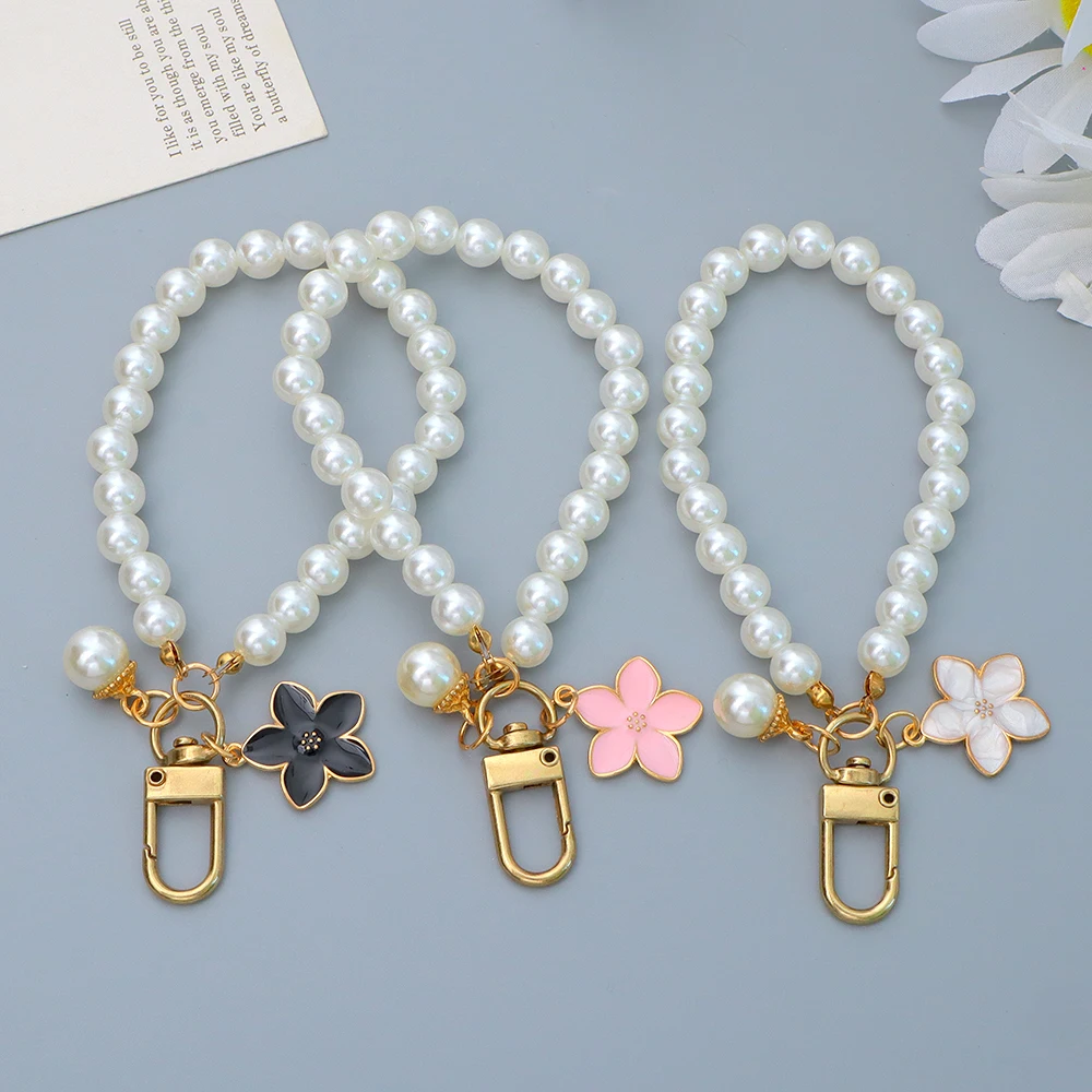 Moda sakura flor chaveiro anti-perdido pérola frisado corrente pulseira com chaveiro para mulheres meninas bolsa de telefone u disco ornamento