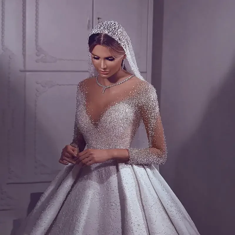 

Customized Beading Long Sleeve Dresses Illusion Neck Saudi Arabic Custom Made Bridal Bride Wedding Gowns