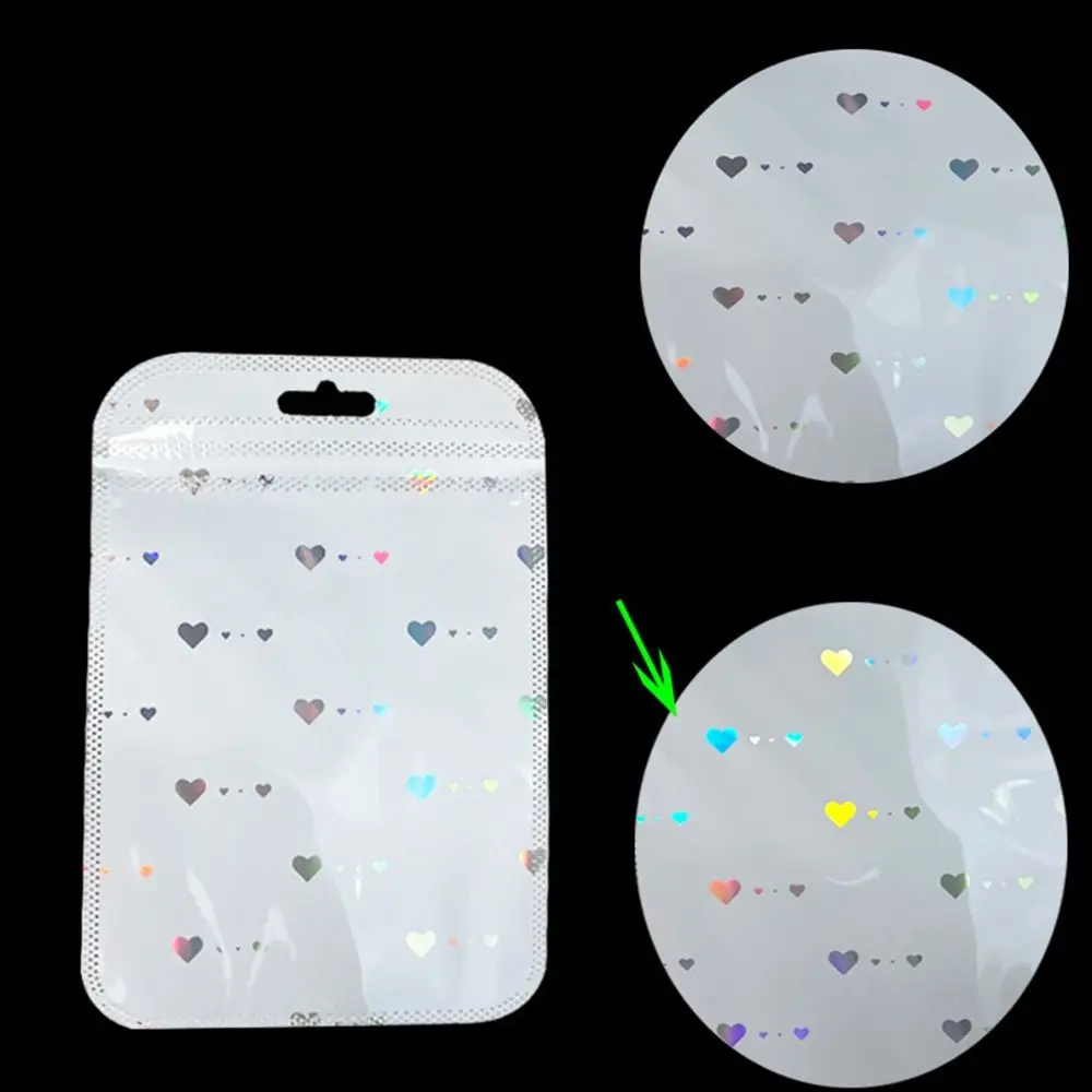 Sacchetto autosigillante in plastica semplice da 50 pezzi sacchetto di imballaggio a cuore Laser richiudibile sacchetti a chiusura lampo