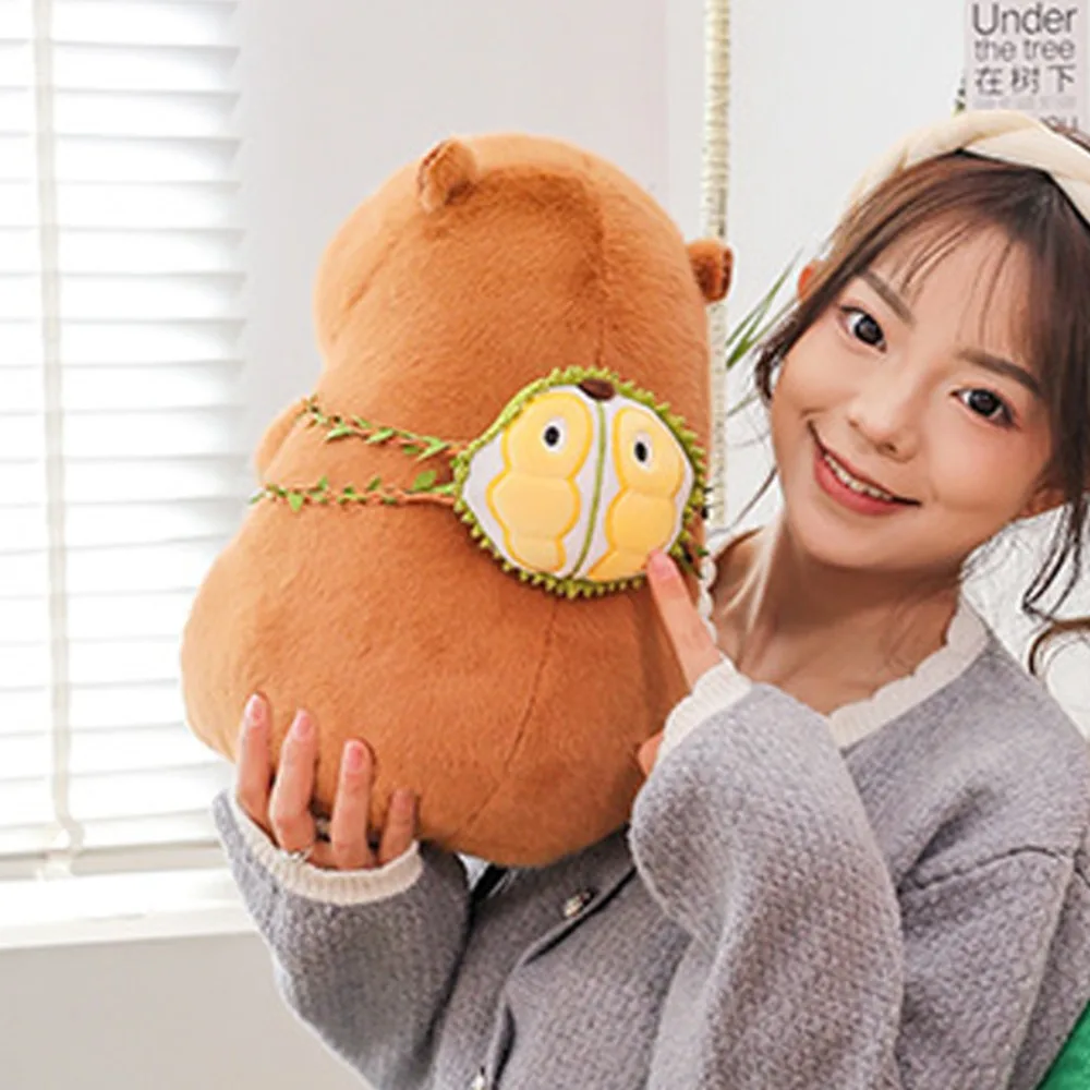 กินทุเรียน Capybara ตุ๊กตา Plush สามารถดึงผลไม้กระเป๋าเป้สะพายหลังจําลอง Capybara เครื่องประดับผ้าฝ้าย PP นุ่มตุ๊กตา Capybara ตุ๊กตา