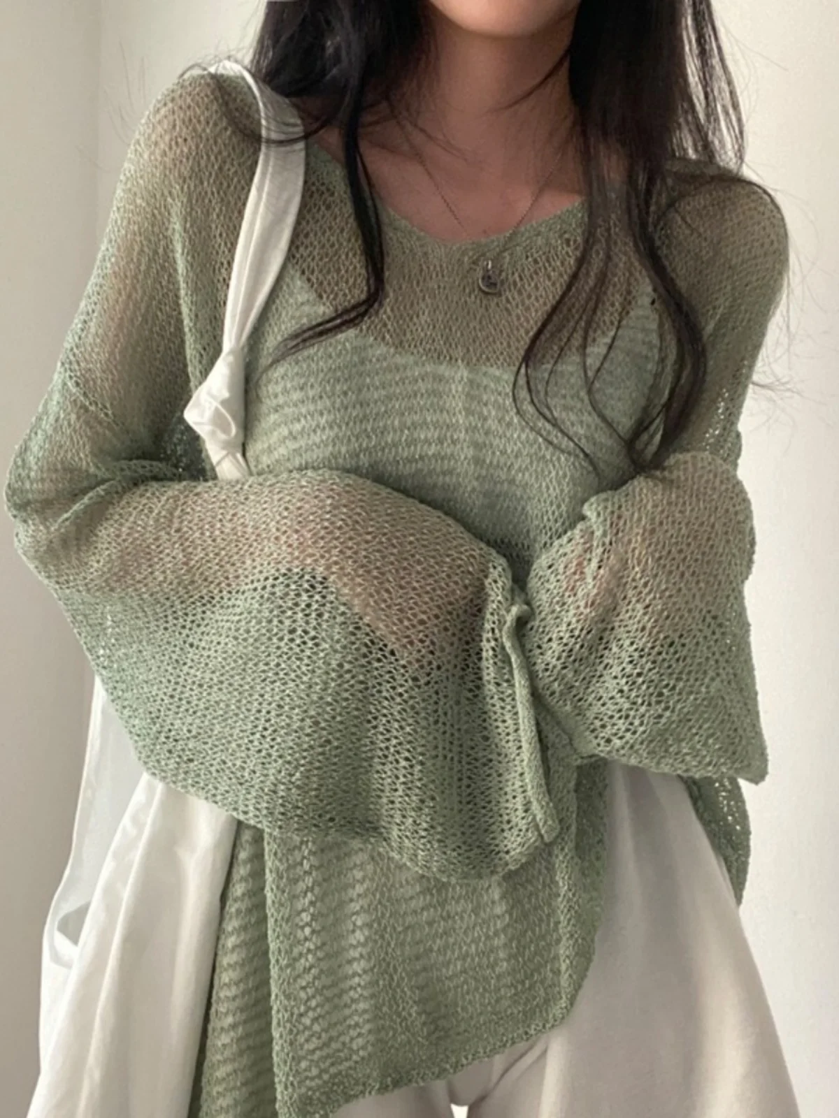 Korean Sle Uneven Knitted Hollow out Top Women's Spring Thin Casual Loose Lazy Sle Semi-Transparent Long Sve irt