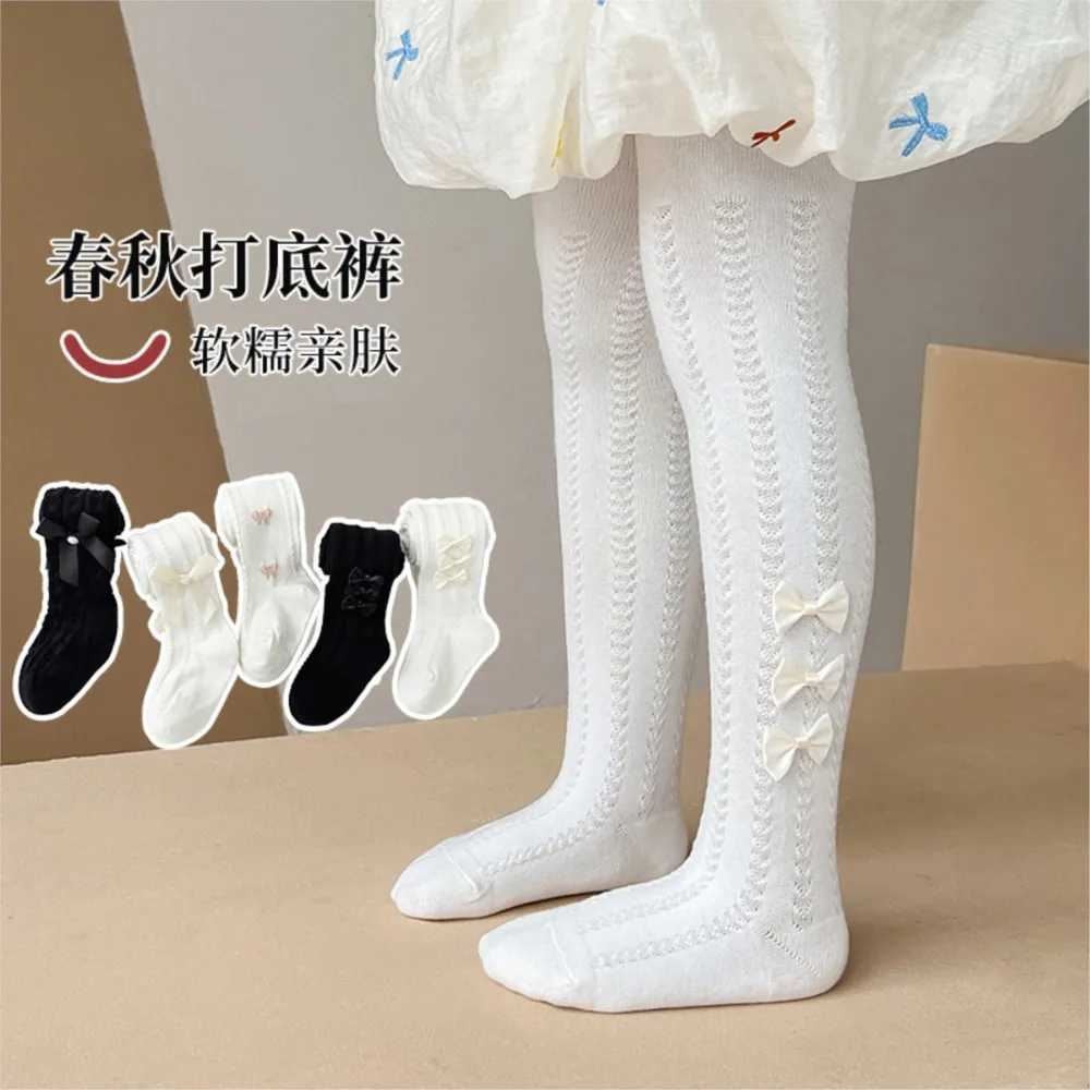 Spring and autumn new side bow children's pantyhose girls wearing leggings three butterfly baby socks for children.