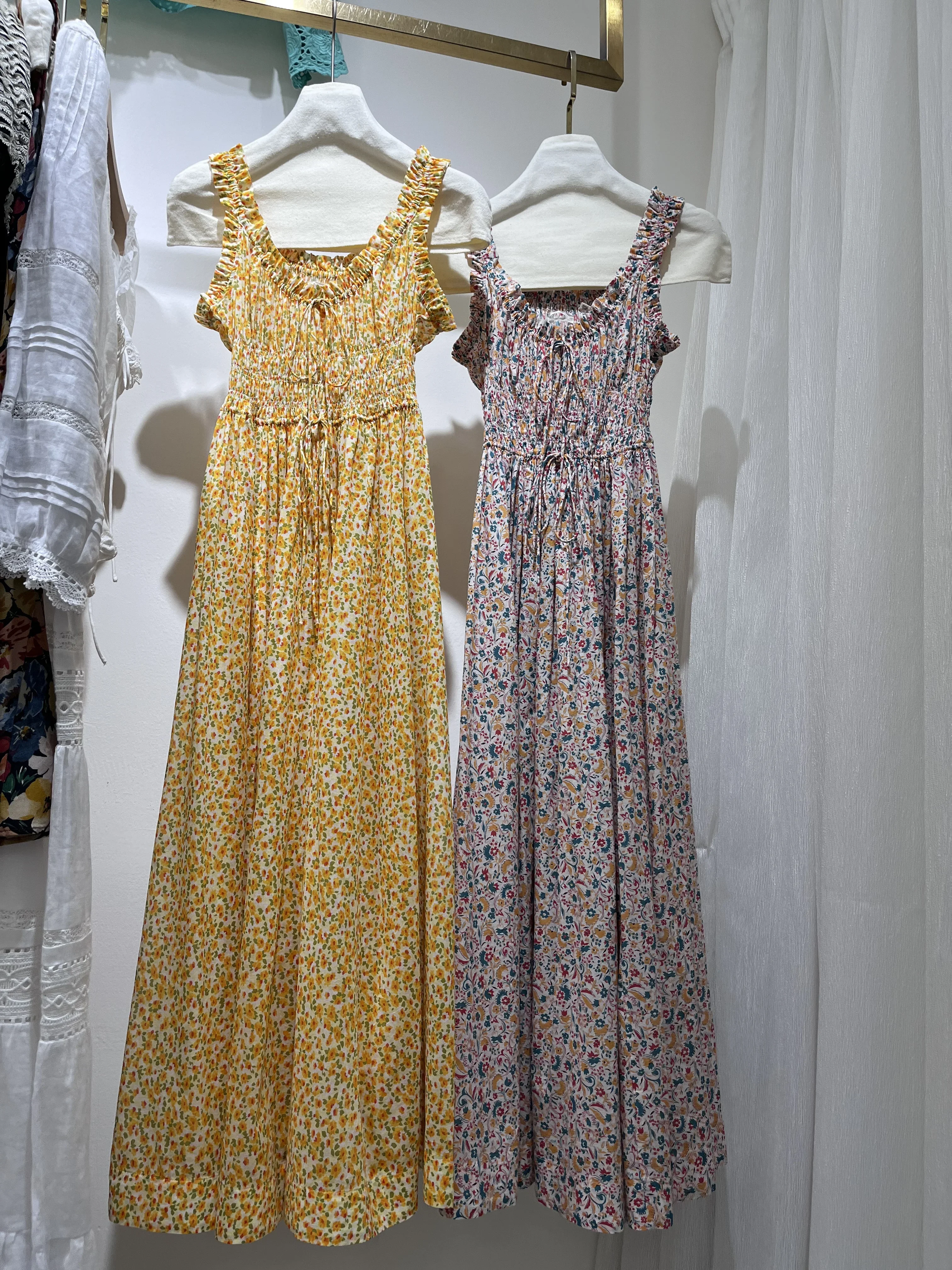 Abito lungo da donna in cotone con stampa floreale 2025 Nuovo abito da donna vintage senza maniche con elastico in vita smock