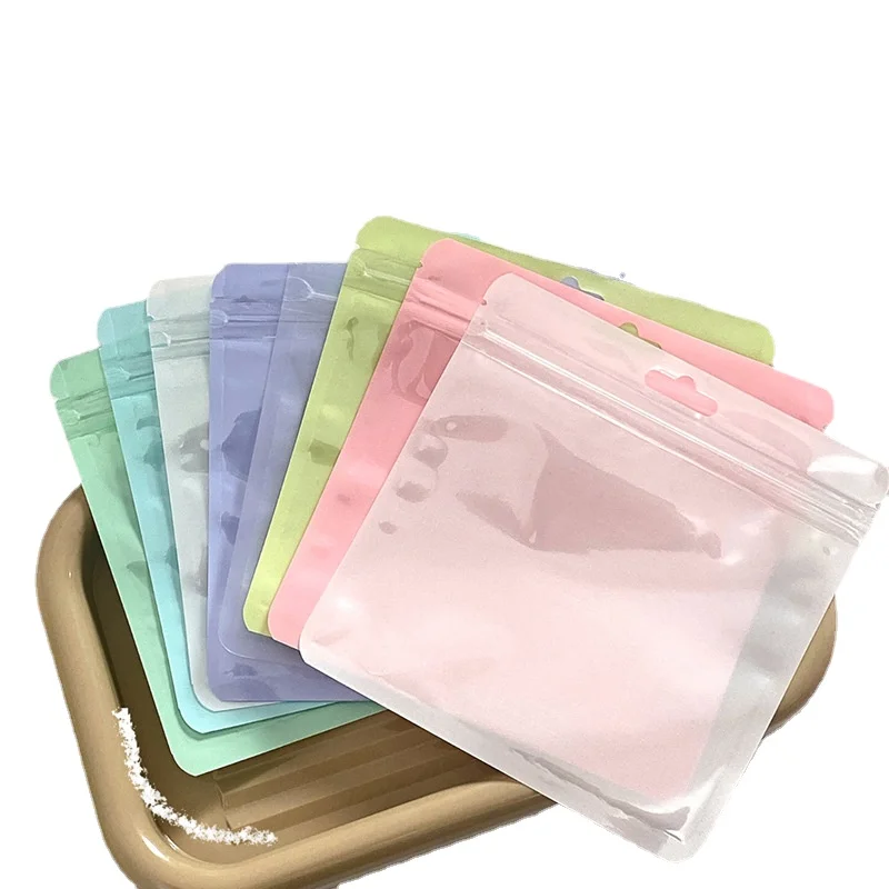 

20pcs Macaron Color Self Sealing Bag Candy Trinkets Transparent Plastic Bag Home Travel Clothing Cosmetics Card Packaging Bags