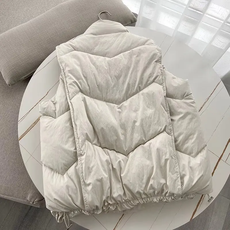 เสื้อกั๊กผ้าฝ้ายบุใยสำหรับผู้หญิง ฤดูหนาว คอตั้ง อุ่นสบาย ทรงหลวม สีพื้น สไตล์ลำลอง