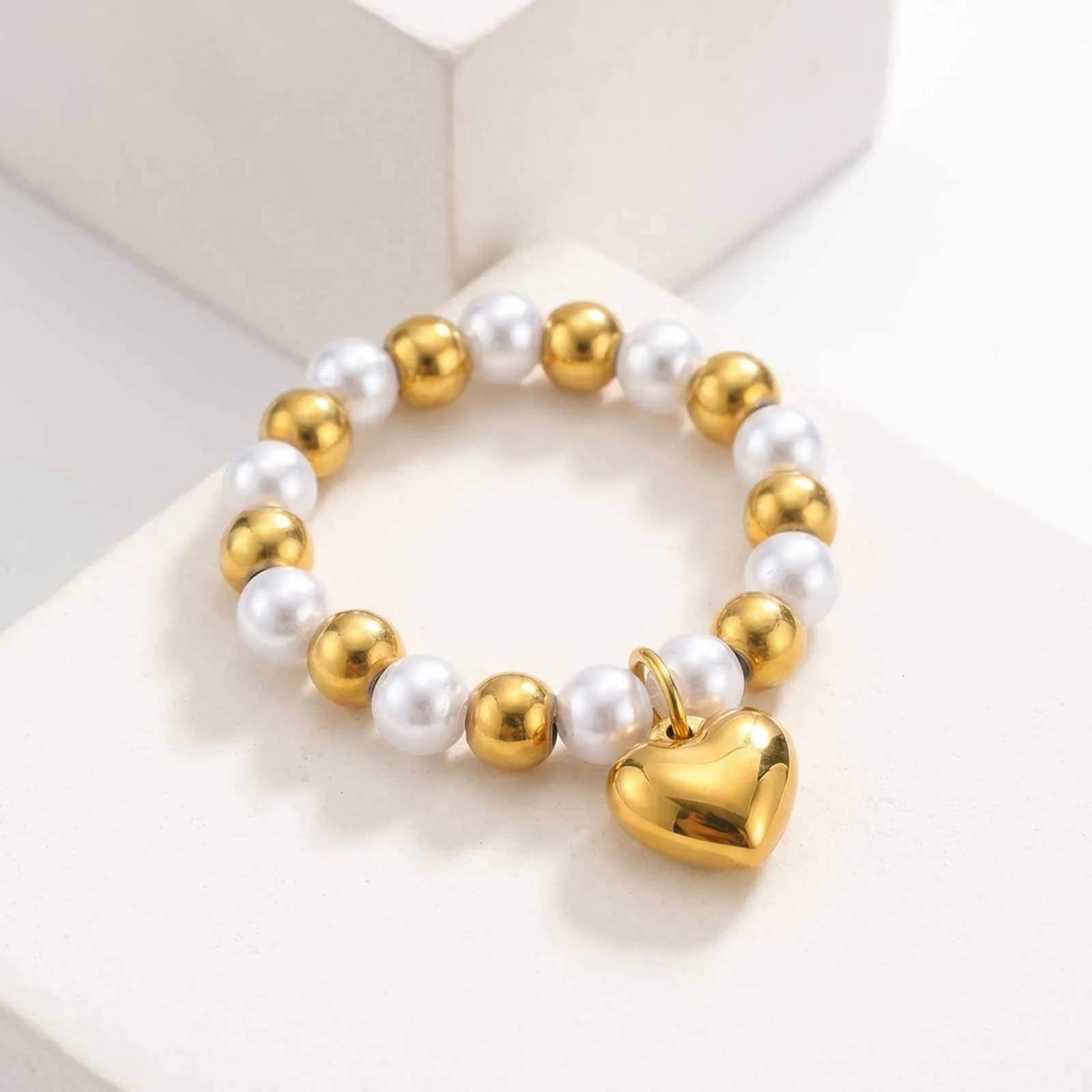 Stainless steel heart-shaped imitation pearl steel bead ring - luxurious and simple design for women, model RC-987