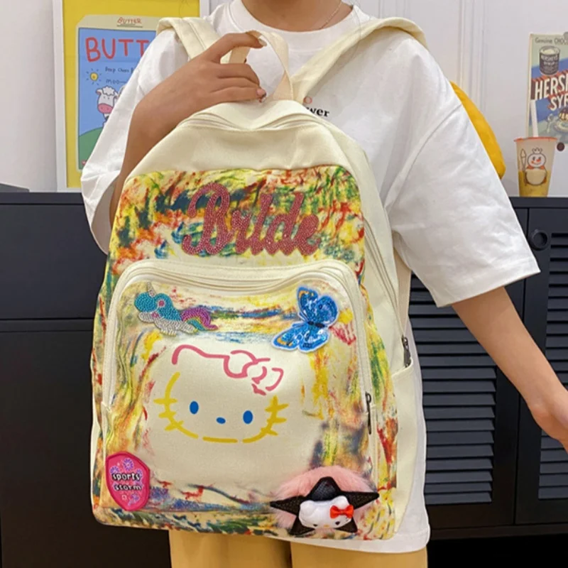 Sanrio Hello Kitty Cartoon Graffiti Fashionable Backpack Sweet Cute Girl Shoulder Bag Anime Printed Student Bookbag