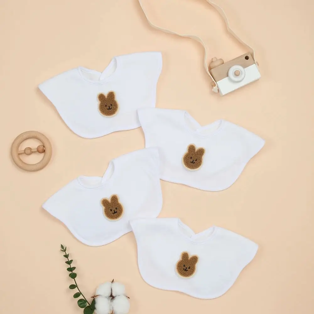 

Набор из 4 мягких и впитывающих детских нагрудников с рюшами, регулируемыми кнопками и гипоаллергенным покрытием (белые)