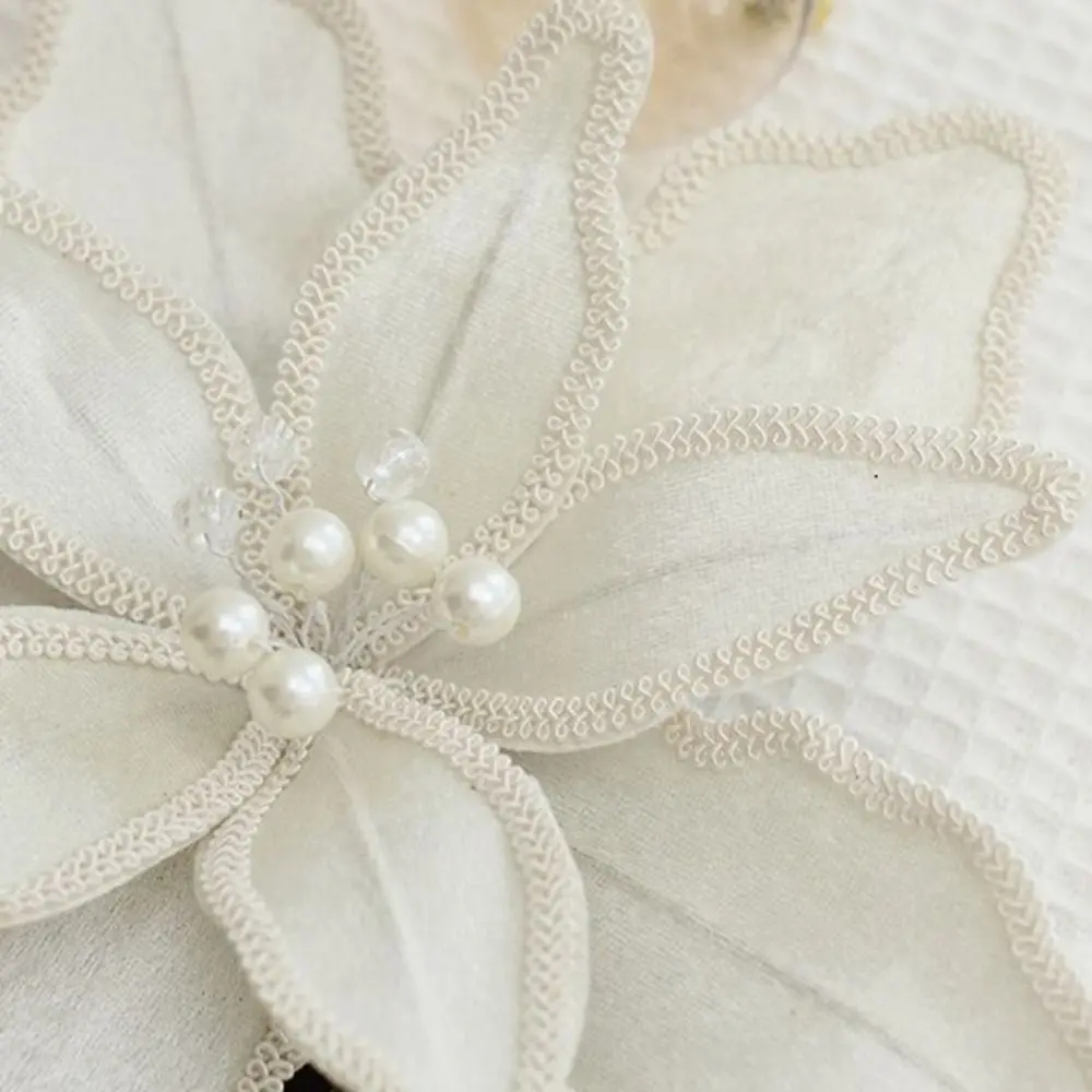 ألوان نابضة بالحياة زهرة عيد الميلاد الاصطناعية عالية الجودة طويلة الأمد محاكاة زهرة عيد الميلاد لافتة للنظر زهرة بريق احتفالية