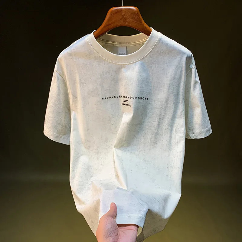 เสื้อยืดแขนสั้นผู้ชายดีไซน์ย้อนยุคแนวโน้มฤดูร้อนหลวมคิดถึงเสื้อเรียบง่ายและทันสมัย