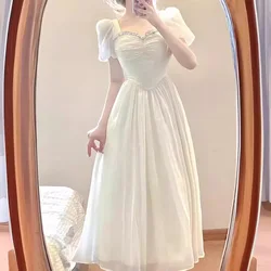 Bubble sleeve dress female summer new French gentle wind high sense socialite temperament waist slim long skirt.