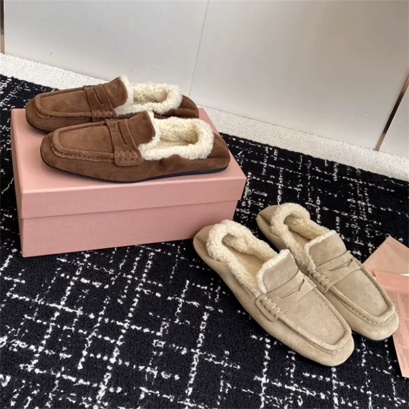 

The new penny loafers are made from smooth suede and trimmed with shearling for a soft and warm feel. They have a rounded silhou