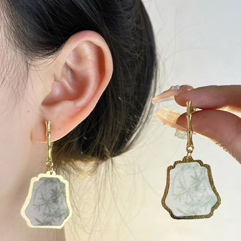 

**New Chinese retro national style fan earrings