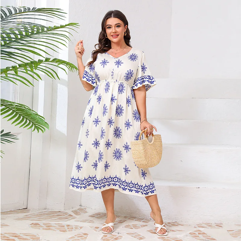 

Loose large size horn sleeve V-neck dress, seaside vacation fresh printing medium and long dress, fashionable, simple and elegan