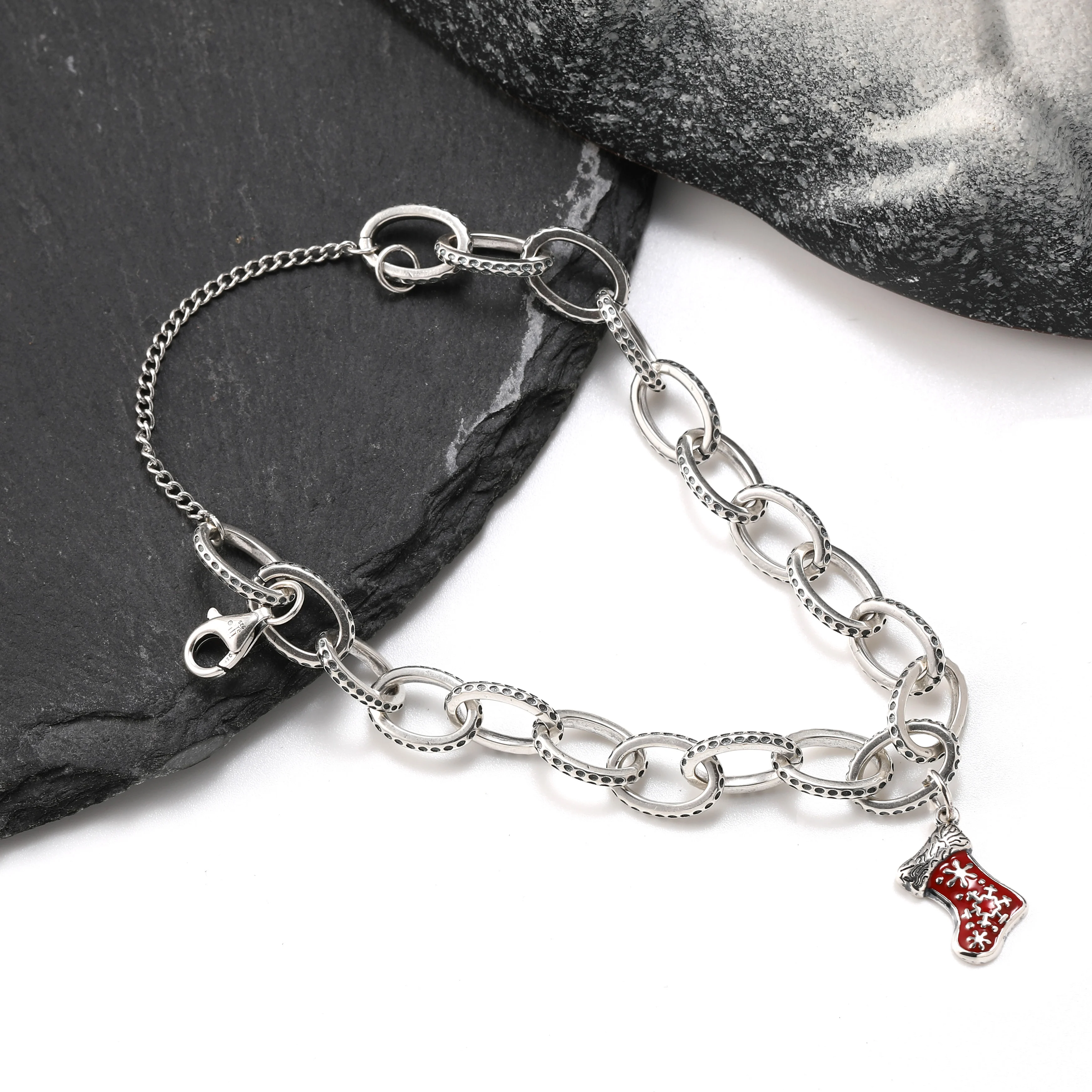 

Genuine 925 sterling silver exquisite Textured Oval Charm Bracelet paired with Enamel Christmas stocking pendant