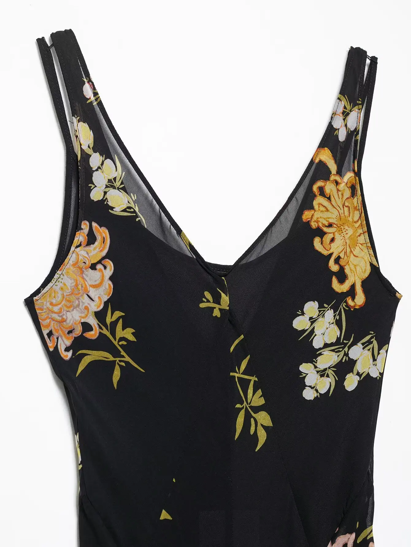   Damska sukienka midi bez rękawów z dekoltem w kształcie litery V, zdobiona kwiatami, rozkloszowana, idealna na lato, zapewniająca szykowny i zwiewny wygląd.