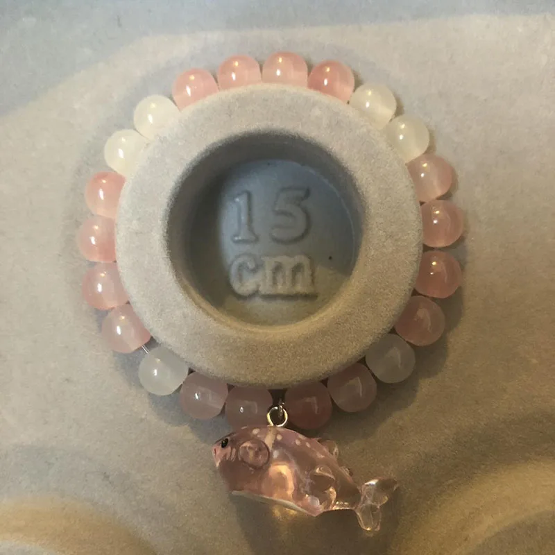 White and pink whale bead bracelet Wont break Homemade