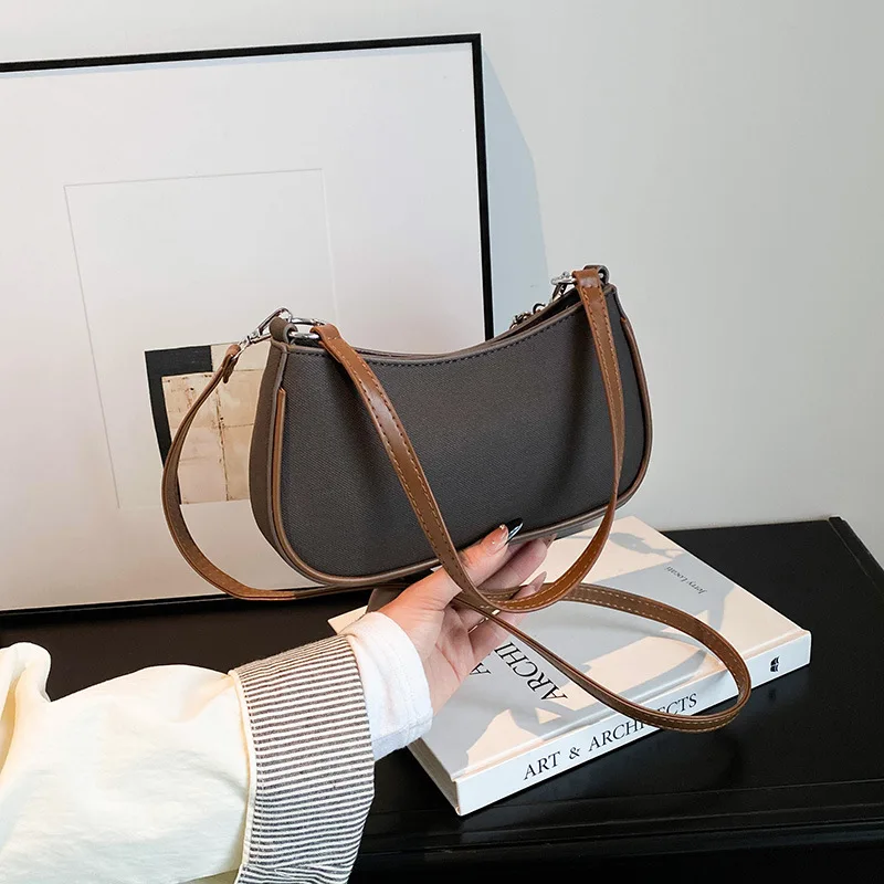 

Fashionable and trendy solid-color handbag, simple and new small square bag, stylish and high-quality single-shoulder armpit bag