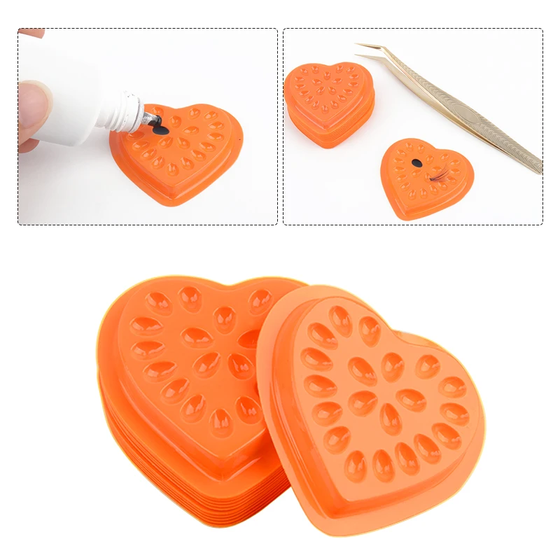 100 pz a forma di cuore colla per ciglia supporto per supporto Pallet adesivo guarnizione in Pvc innesto ciglia pad forniture di estensione strumenti per il trucco