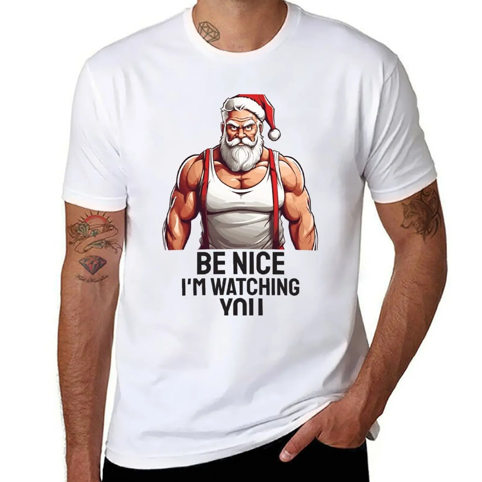 

Muscular Santa. Be nice. I'm watching you! T-Shirt cotton t shirt pack man t shirts for men T-Shirt