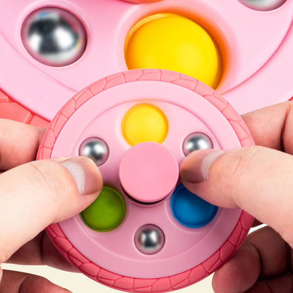 

Tyre Shape Small Gyro Bounce Creative Plastic Rotating Gyroscope for Children Hand Eye Coordination Educational