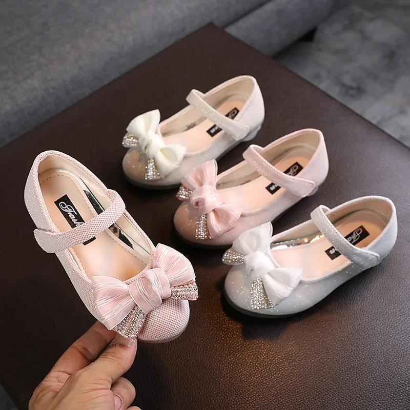 

2025 Children Shoes Spring Shiny Bow Soft Soled Leather Shoes Elegant Beauty Antiskid Princess Dance Shoes Zapatos Princesa Niña