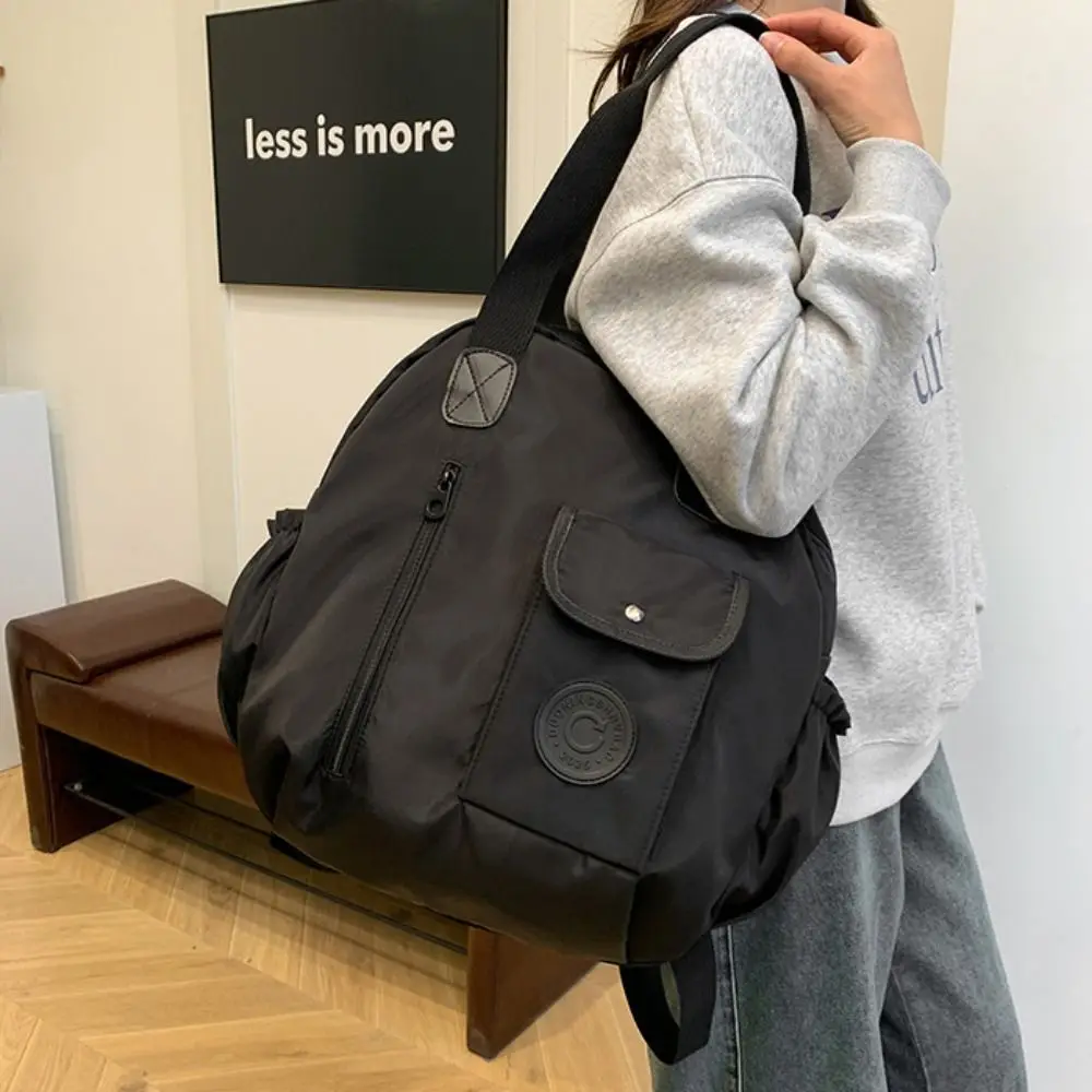 กระเป๋าเป้สะพายหลังไนลอนสไตล์เกาหลีน่ารัก สีพื้น ทรงกลม กระเป๋าสะพายไหล่ กระเป๋าโท้ท ความจุเยอะ เหมาะสำหรับออกกำลังกายและกิจกรรมกลางแจ้ง