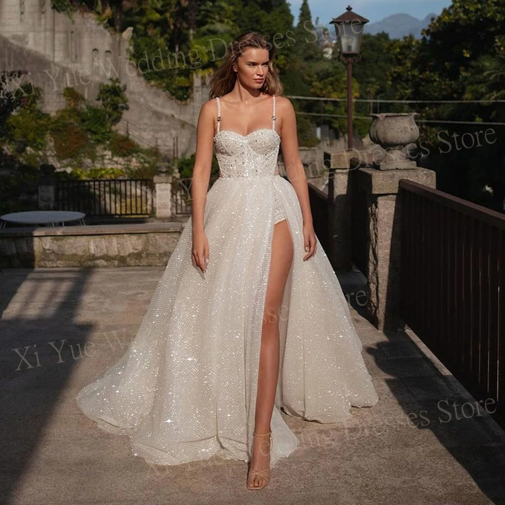 

Luxury Charming A-Line Wedding Dresses Sleeveless Sweetheart Spaghetti straps Sequined Glitter Bride Gowns Lace Up Floor-Length