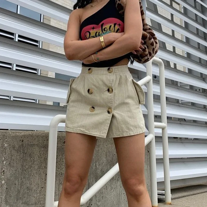 Estate moda femminile nuovi prodotti Street stile retrò tasca bottone cucitura gonna femminile tasca bottone cuciture gonna