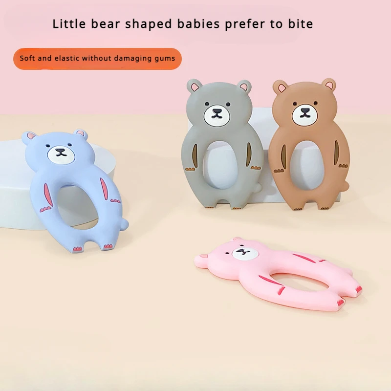 

Cartoon teddy bear baby calming and anti biting silicone gum food grade children's chewing and grinding stick