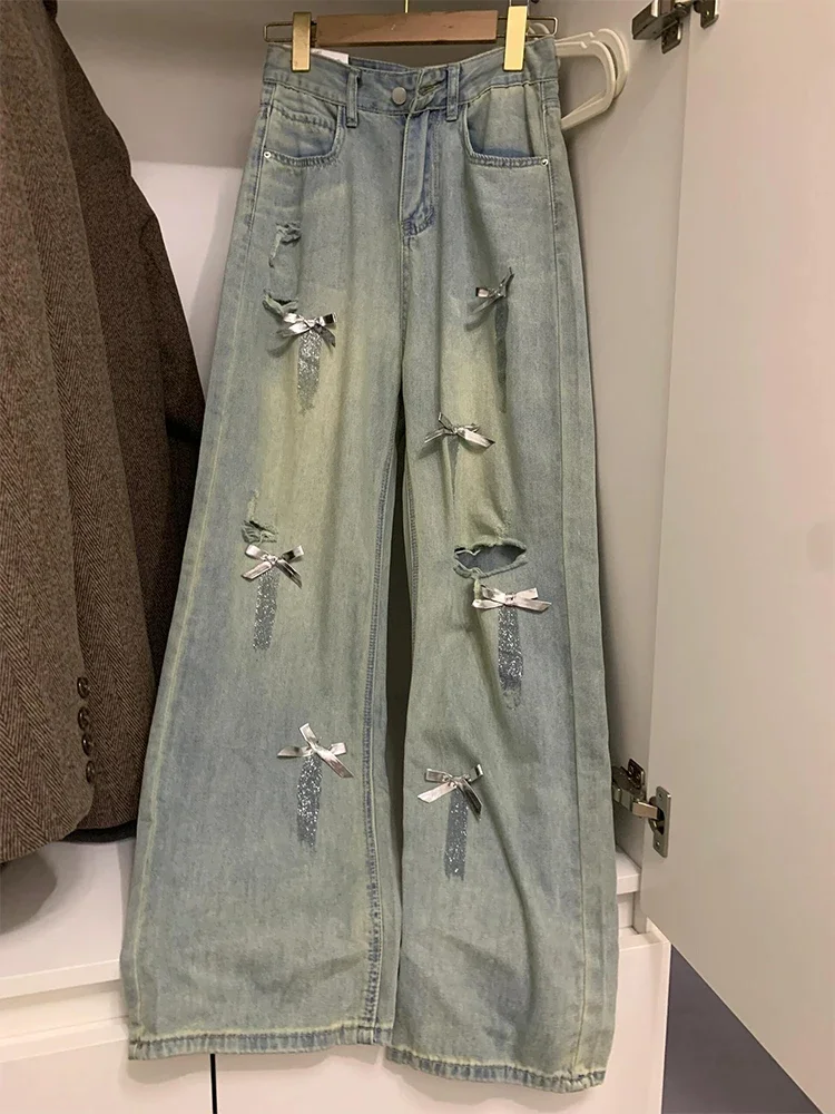 Jeans a gamba larga con fiocco strappato di grandi dimensioni donna americana 2024 estate nuovi pantaloni larghi in Denim sottile con tasca a vita