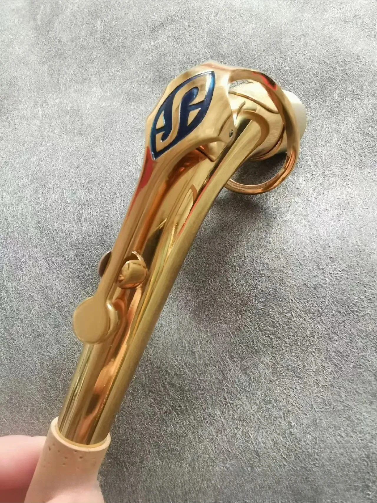 lacquered-gold-mid-range-saxophone-curved-neck-bluish-bronze-outer-diameter-245-music-instrument-accessory