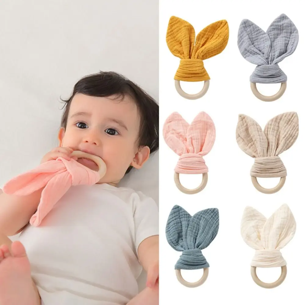 

Soft Baby Wooden Hand Grasp Toy Rabbit Ears Natural Wooden Newborn Teething Ring Sensory Toy Bracelet Rattle Chewing Appease Toy